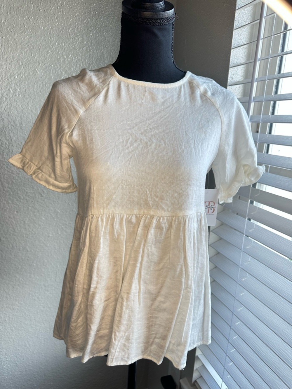 Women's Cream Ruffle-Sleeve Peplum Tunic Top